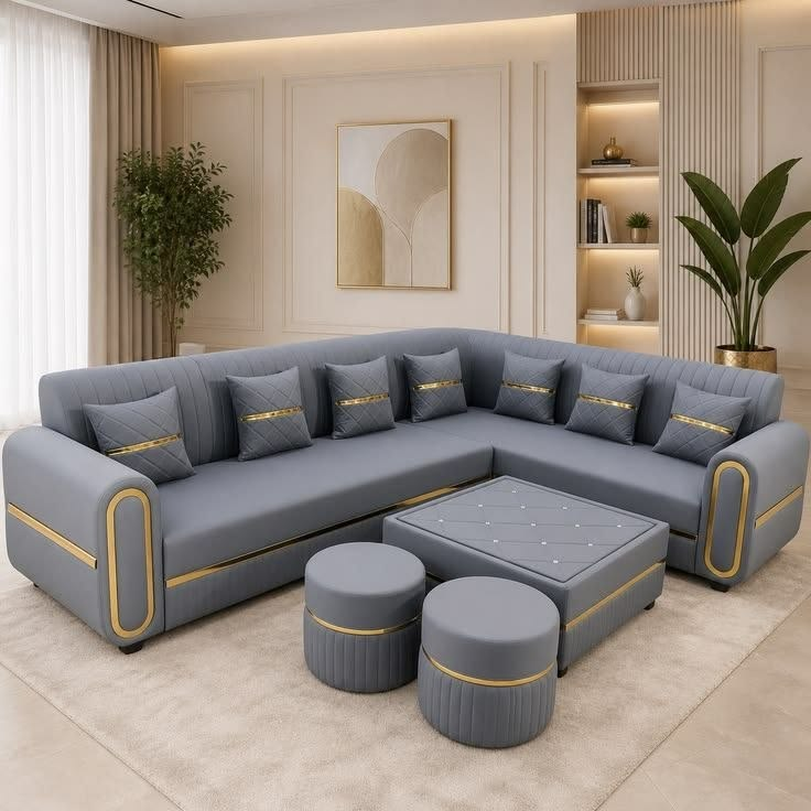 Grey sofa set in a luxury living room with a warm beige colour palette